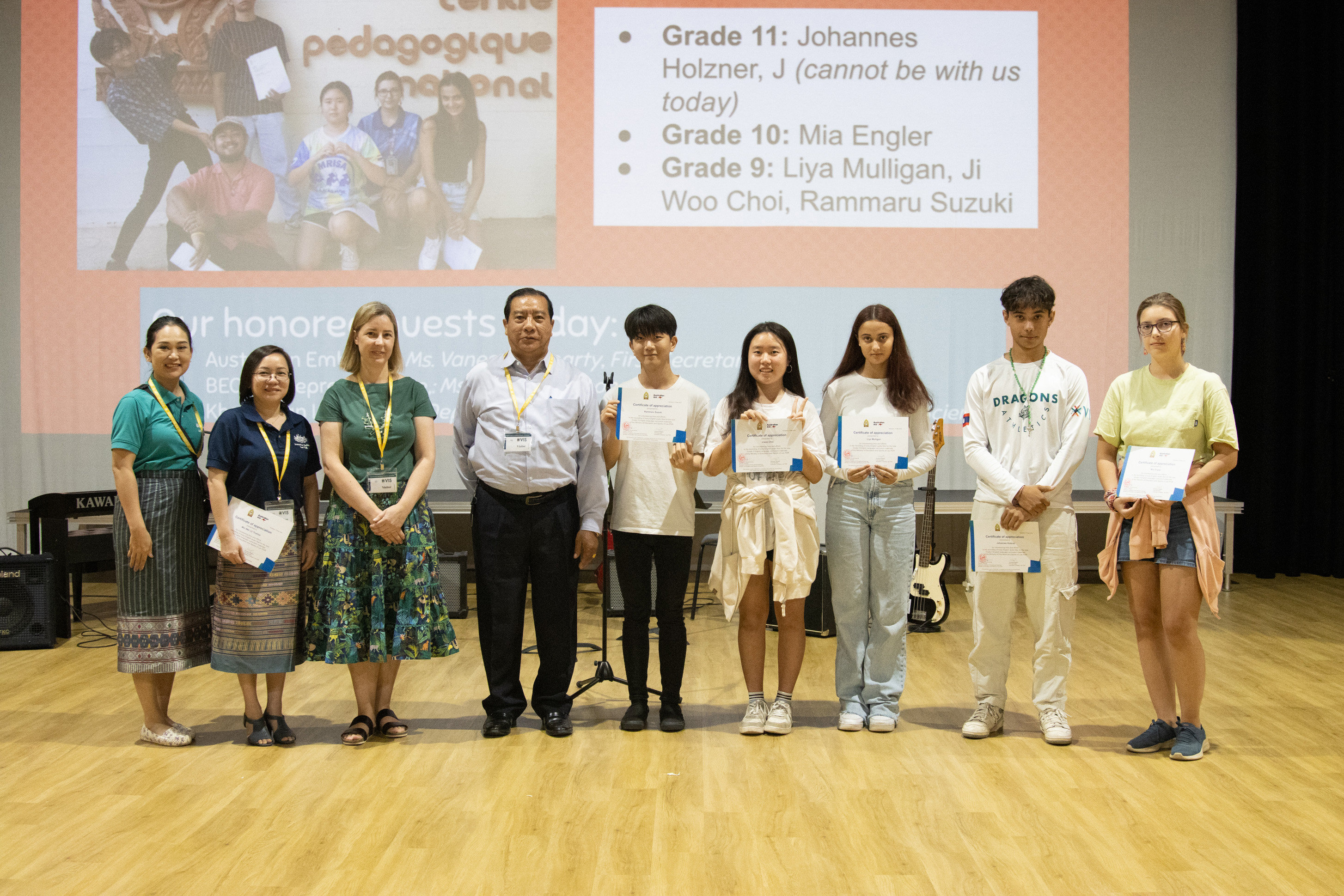 Australia and Ministry of Education handing over certificates to the young volunteers
